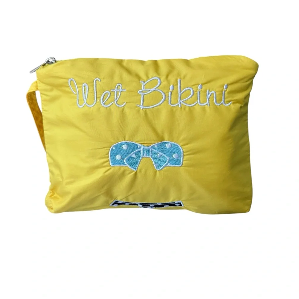 Charming Charlie Yellow Cosmetic Bag with‎ Blue Bow